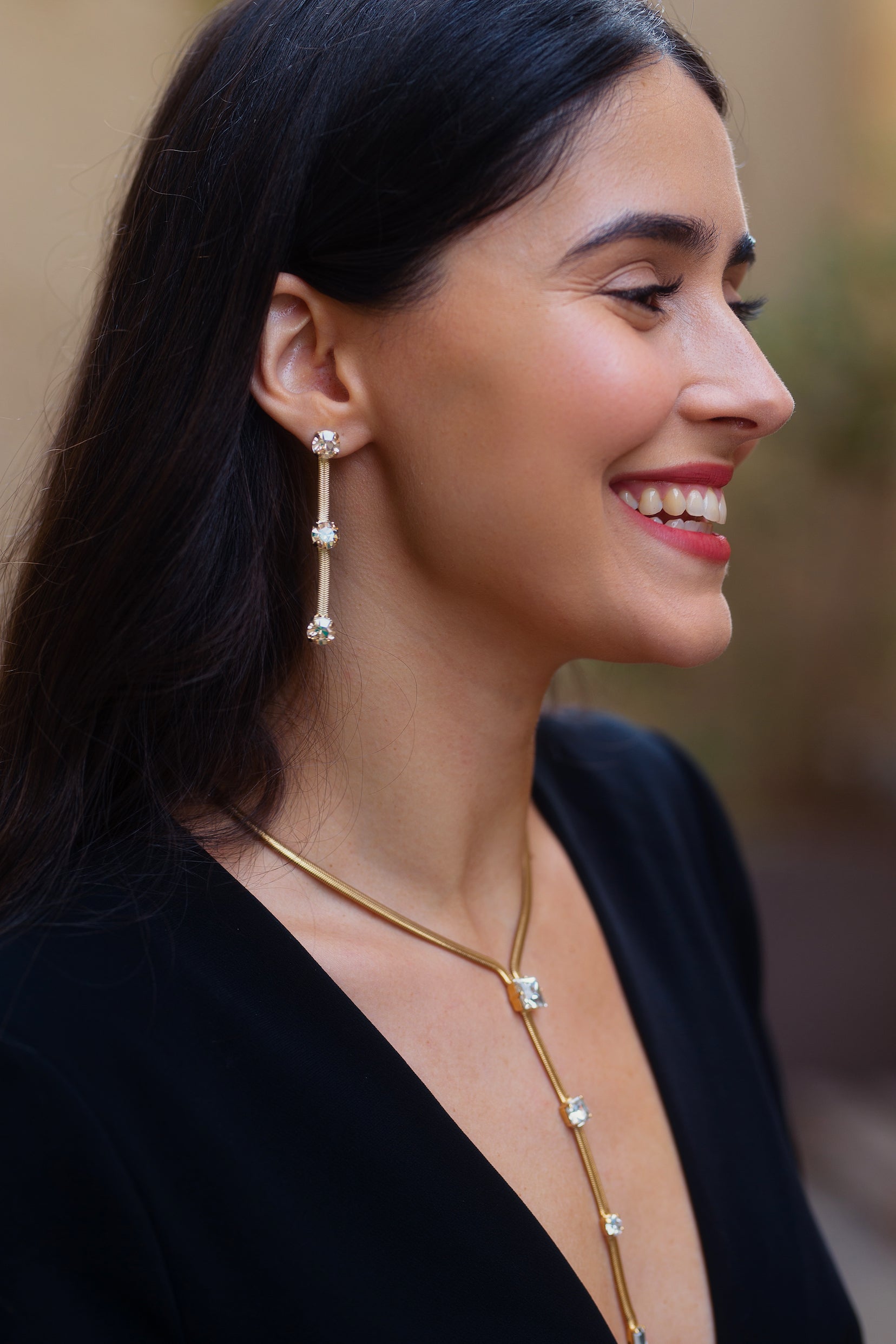 photo of a woman wearing a Square Drop jewelry