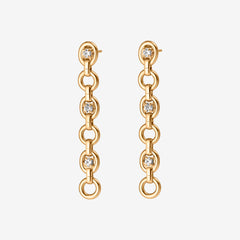 Gold chain earrings with diamond-like stones on a white background