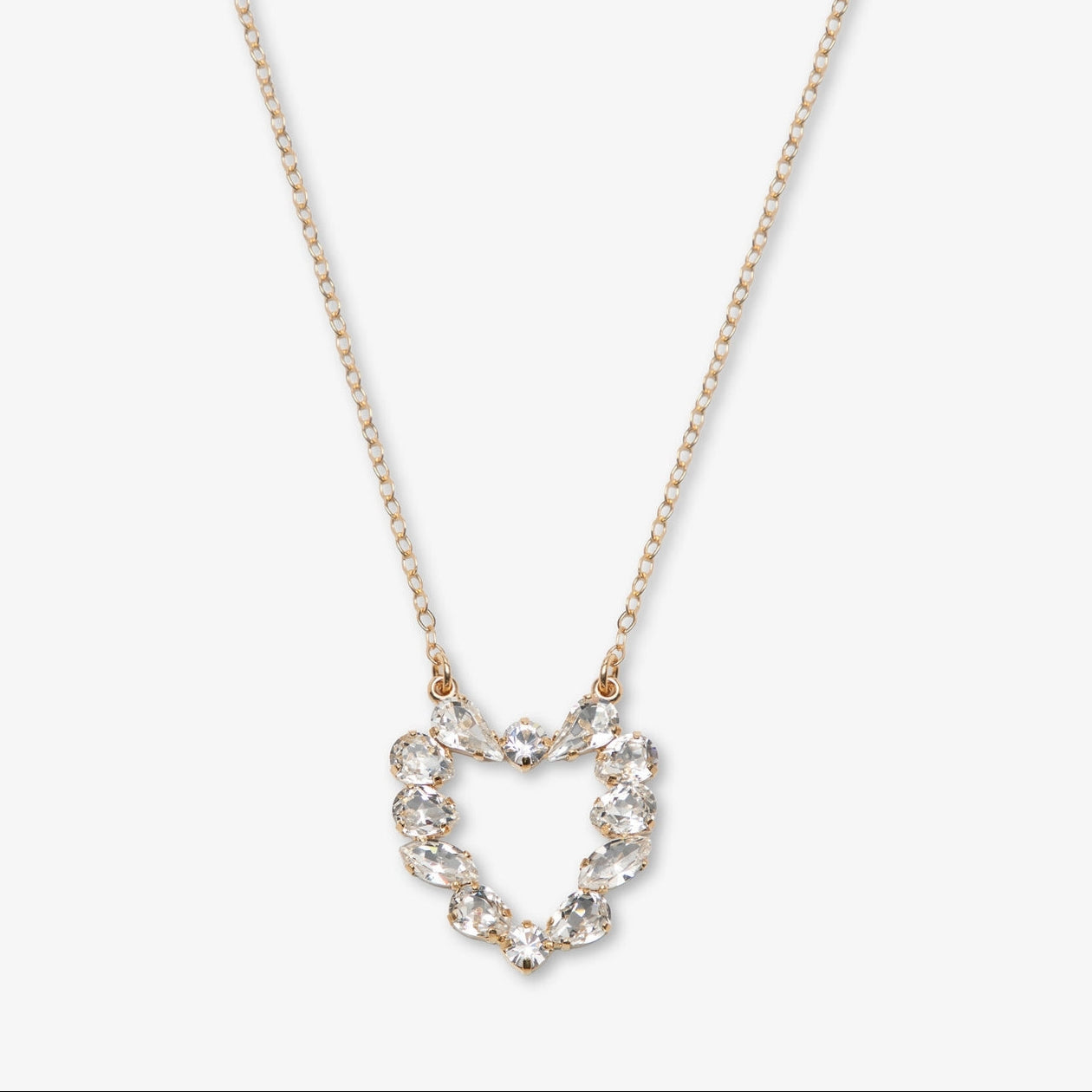 Heart-shaped diamond necklace on a white background