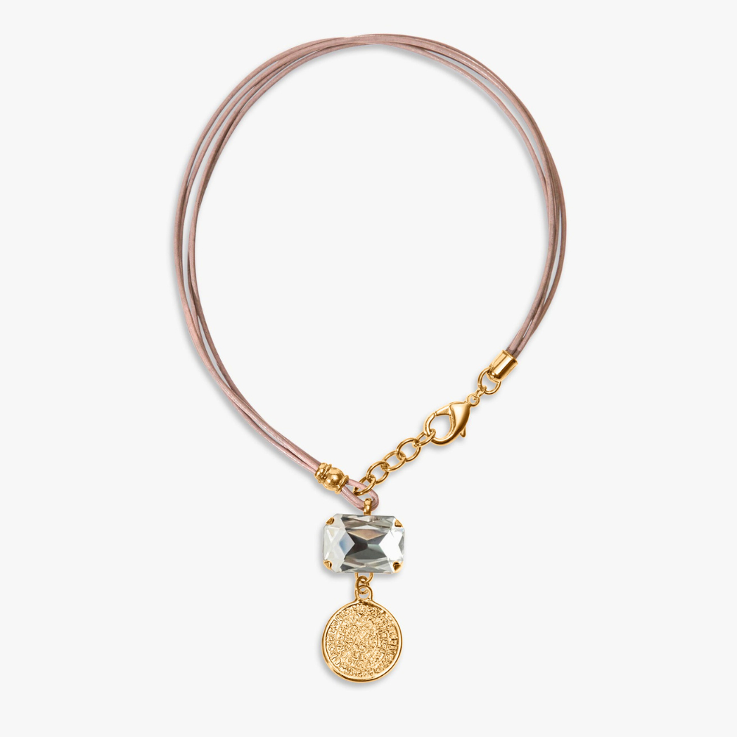 Necklace with pink cord, gold chain, and crystal pendant on a white background