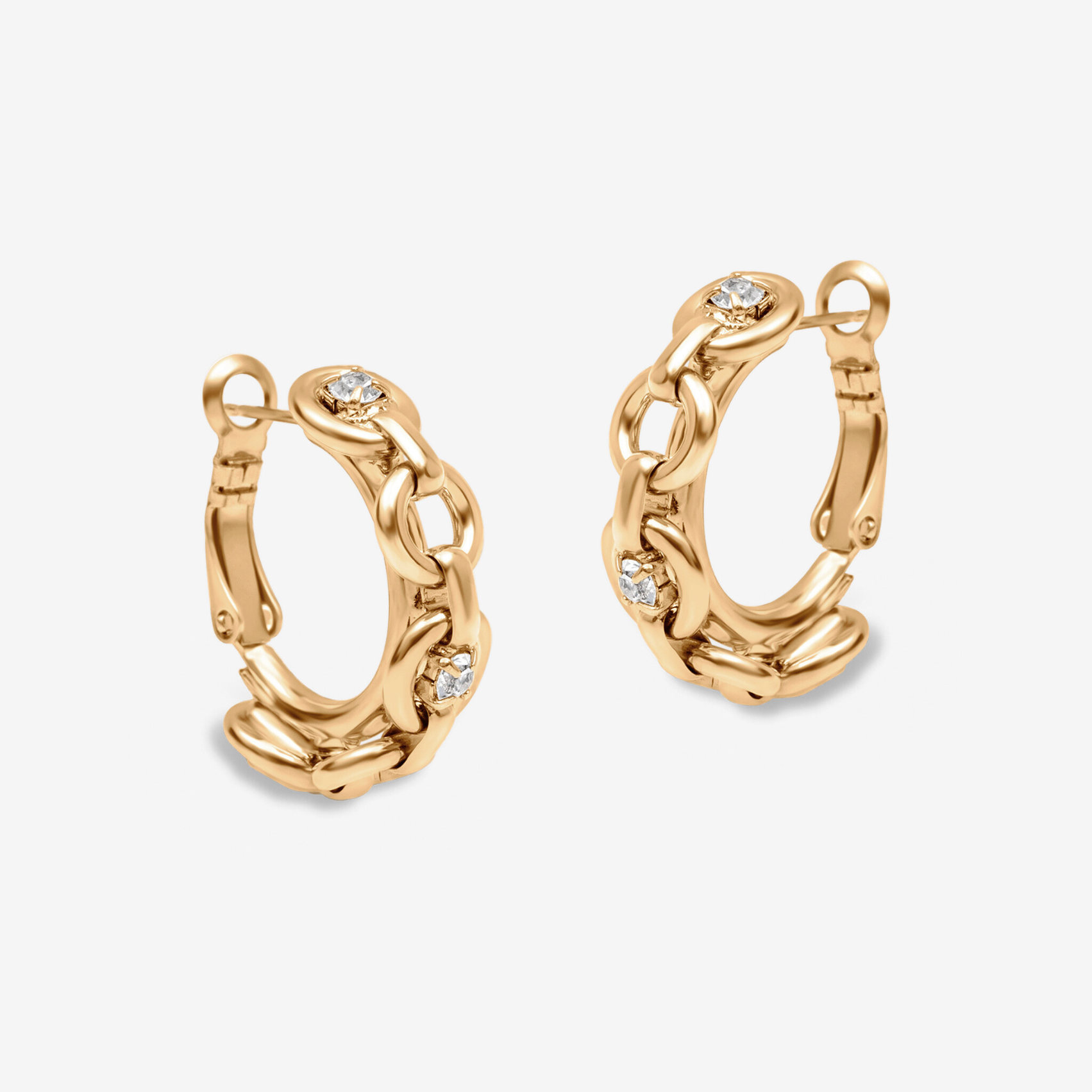 Gold hoop earrings with diamond accents on a light gray background