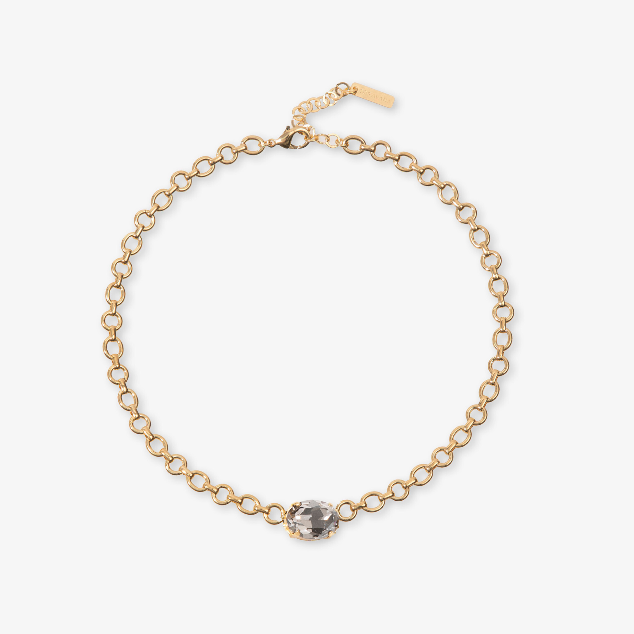Gold chain bracelet with a dark bead on a white background
