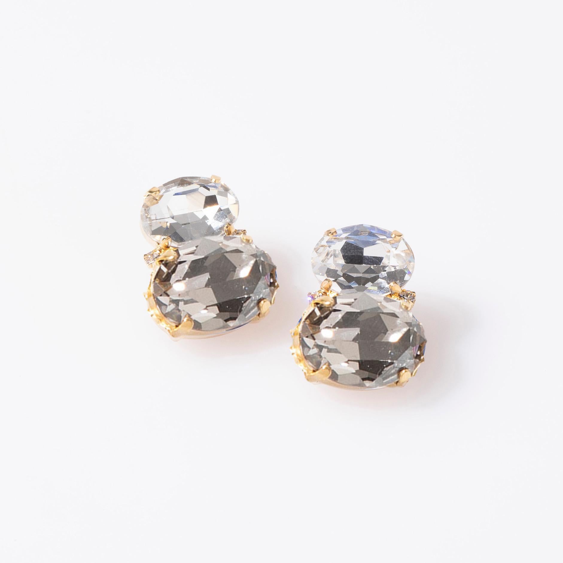 Pair of crystal earrings on a white background