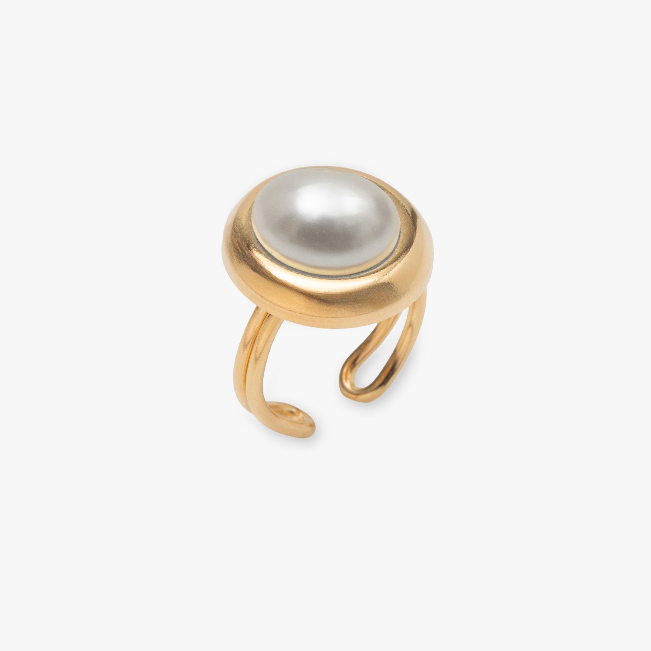 Gold ring with a pearl on a white background
