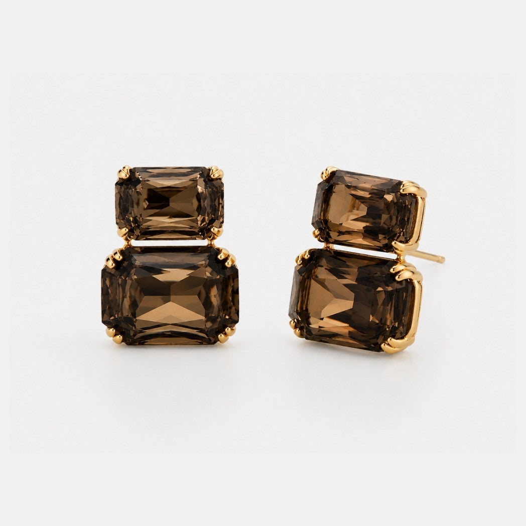 A pair of gold stud earrings featuring stacked rectangular smoky brown gemstones in a bezel setting, shown on a clean white background.