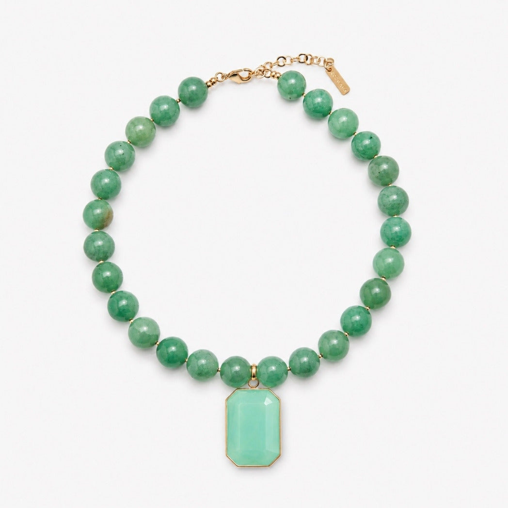 A beaded necklace featuring round green gemstone beads and a central rectangular mint-green stone pendant with gold-tone borders, displayed on a clean white background.
