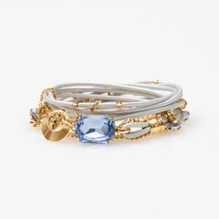 A Mini Stardust Bracelet with a crystal centerpiece, decorated with small crystal beads, and featuring a gold-colored easy-hook closure.
