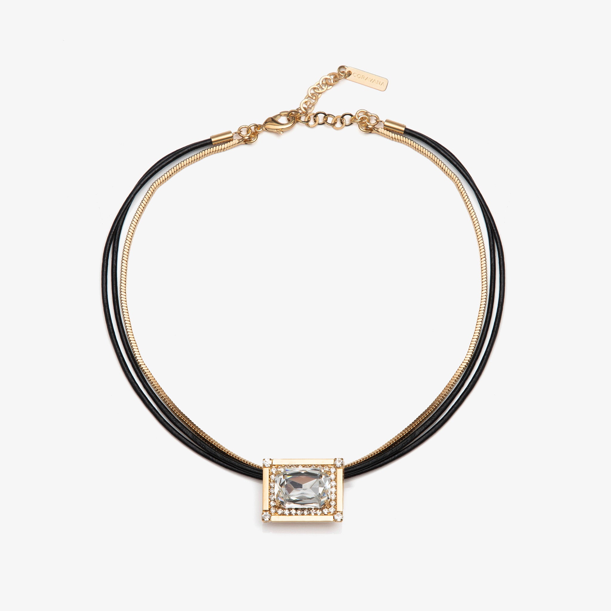 Necklace with black cord and gold clasp on a white background
