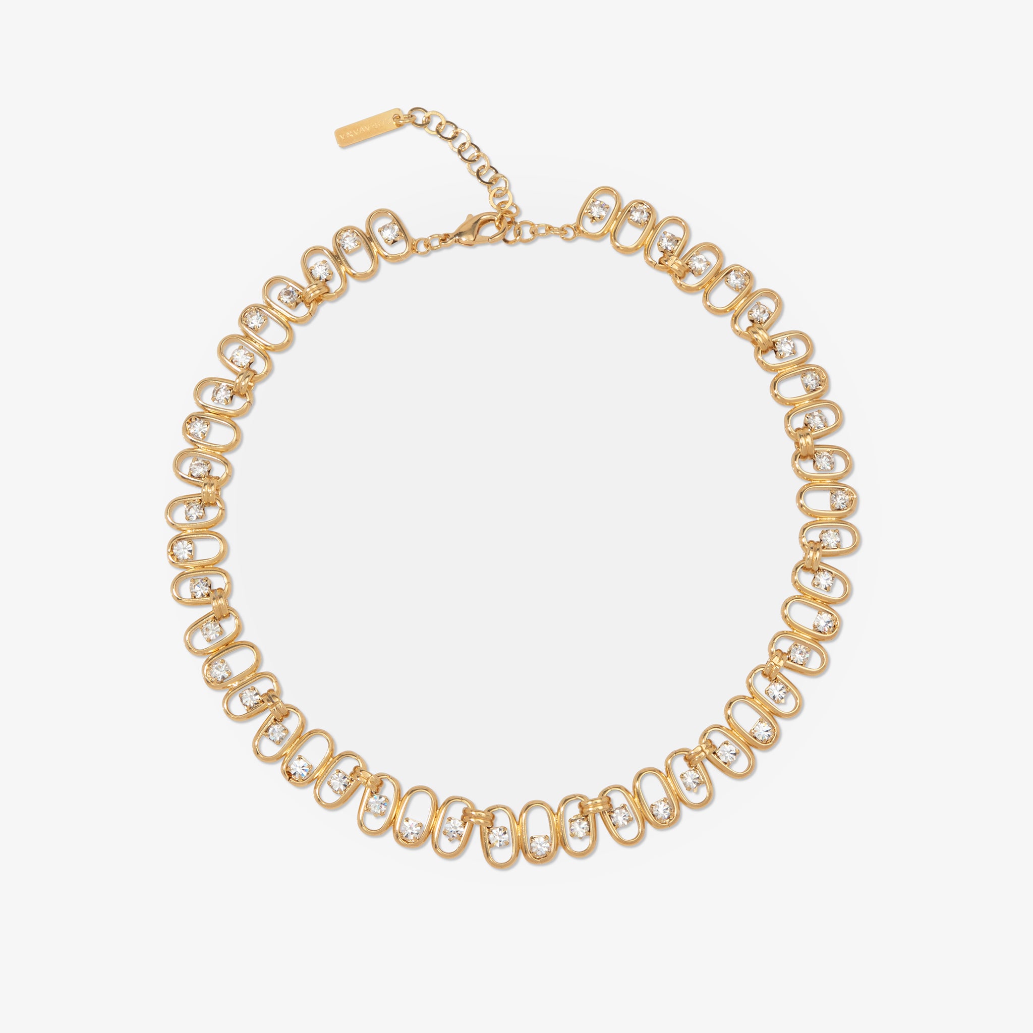 Gold necklace with circular links on a white background