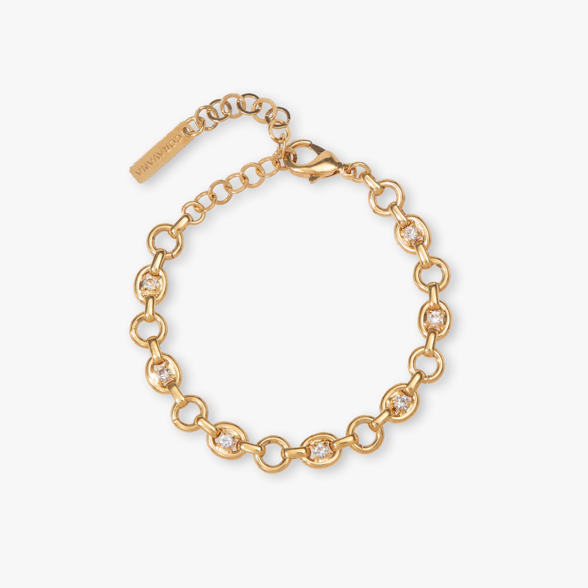 Gold chain bracelet with diamond accents on a white background