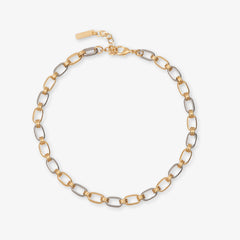 Gold and silver chain bracelet on a white background