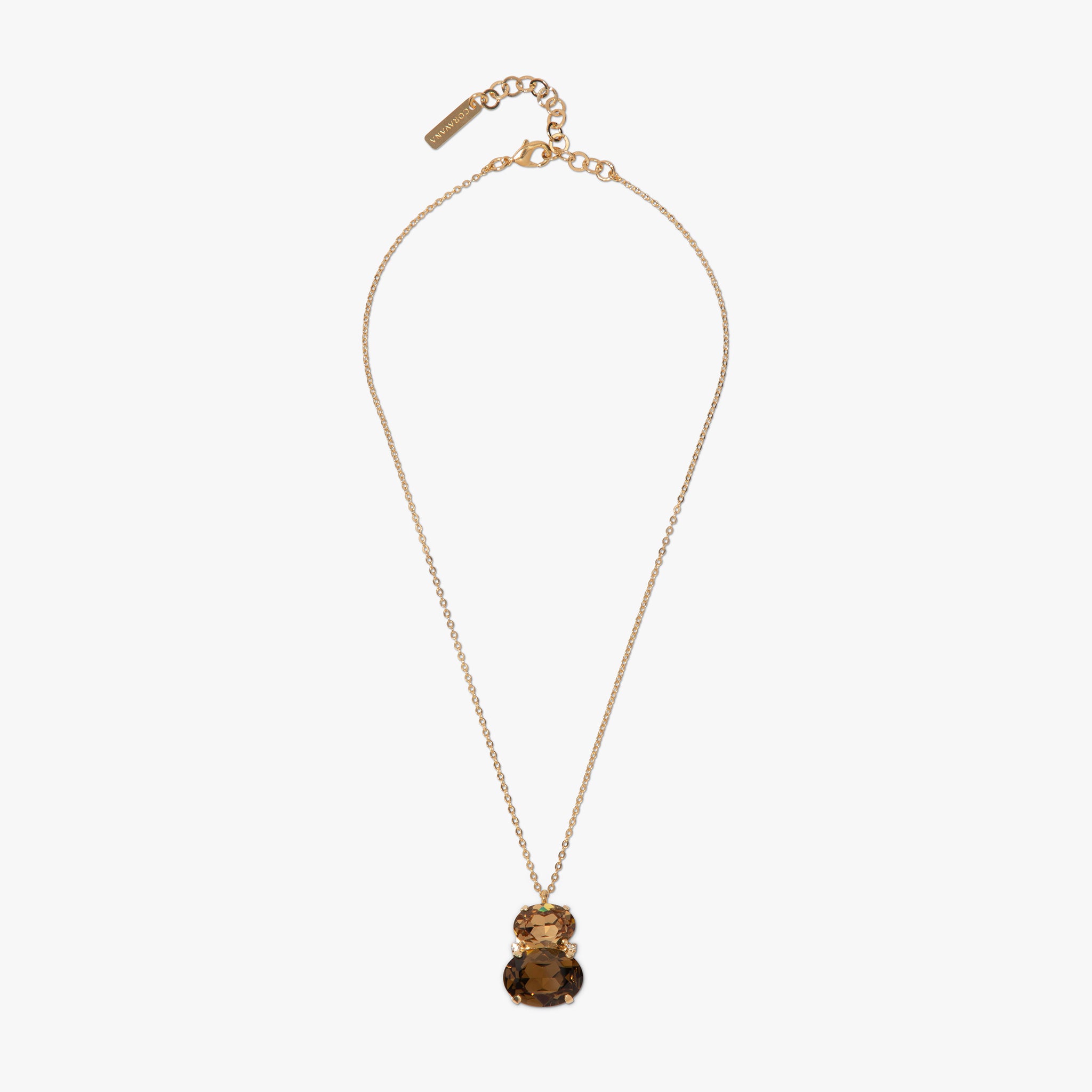 Gold necklace with a pendant on a white background