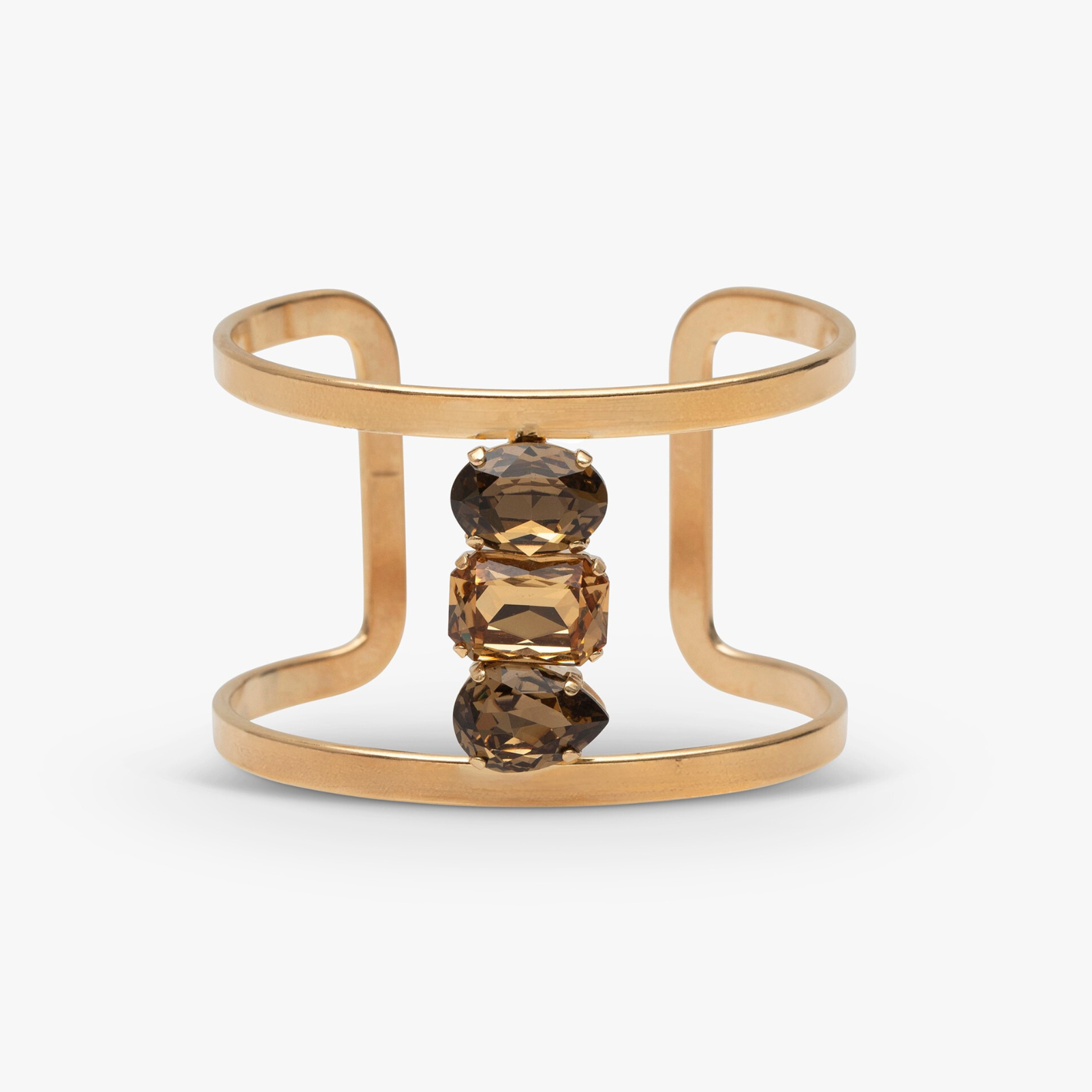 Gold bracelet with brown beads on a white background